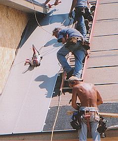 stndseam
A standing seam roof being crimped.
