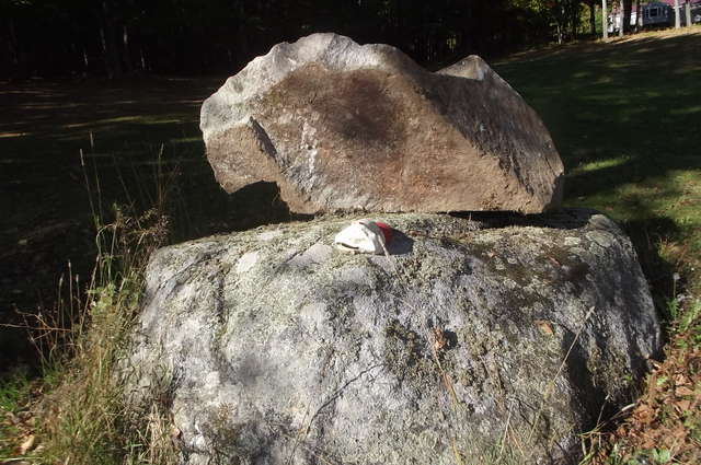 big rock
Could not carry this one,so I pushed it on top of another rock. Hat for size.

