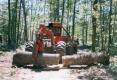 timberjack380_grapple_skidder_oak_log.jpg